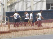 Guayaquil, alumnos en uniformes
                          escolares (primer plano) en la Avenida
                          Cordero