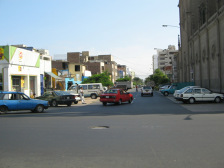 Avenida Huamachuco, imagen de la calle con
                        la fachada de la iglesia