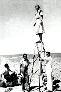 Maria Reiche in 1946 on a ladder